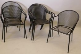 A set of six painted metal garden chairs
