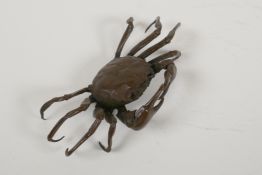 A Japanese Jizai style bronze okimono in the form of a crab, impressed seal mark to base, 6" wide