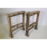 A pair of industrial cast iron table legs, 25½" x 5", 28½" high