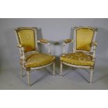 A pair of Louis XV painted and parcel gilt open armchairs, 43" high