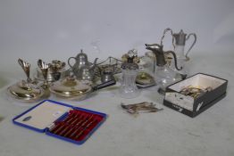 A quantity of silver plate, including a duck shaped claret jug, a hallmarked silver mounted