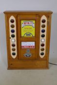 A 1950/60s 'Rotolite' penny arcade game, 21" x 7" x 28"