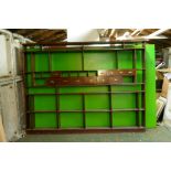 Antique pine and mahogany shop display rack with shelves and another similar, fitted with