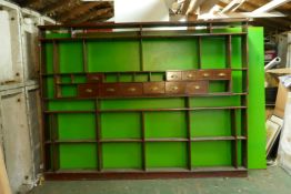 Antique pine and mahogany shop display rack with shelves and another similar, fitted with