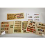 A collection of Chinese albums of facsimile (replica) commemorative stamps, 7" x 10" largest