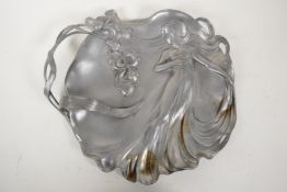 A W.M.F. Art Nouveau pewter tray, formed as a maiden and trailing flowers, 13" x 11"