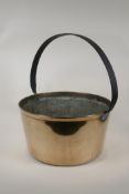 An antique bronze jam pan with iron handle, 13" diameter, 16" high