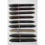 Nine 'Swan' Mabie Todd fountain pens, including five leverless and four self-filling, all with