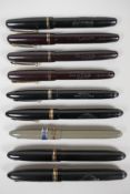 Nine 'Swan' Mabie Todd fountain pens, including five leverless and four self-filling, all with