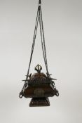 A Tibetan bronze hanging censer and cover, decorated with a vajra knop, the eight Buddhist emblems