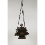 A Tibetan bronze hanging censer and cover, decorated with a vajra knop, the eight Buddhist emblems