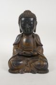 A Chinese gilt bronze Buddha seated in meditation, 9" high