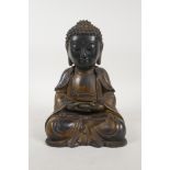 A Chinese gilt bronze Buddha seated in meditation, 9" high