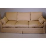 A Duresta three seater sofa with off white linen upholstery, recently re-covered, 101" wide