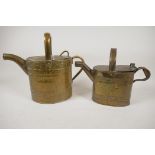 Two vintage brass indoor watering cans, largest 10" high