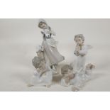 A Lladro porcelain figure of a girl with doves, 8½" high, and three Lladro figures of cherubs