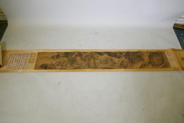 A Chinese printed scroll decorated with depictions of the immortals and extensive calligraphy