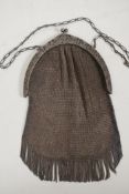 A Continental metal mesh evening purse with pierced and engraved frame, marked 800