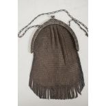 A Continental metal mesh evening purse with pierced and engraved frame, marked 800