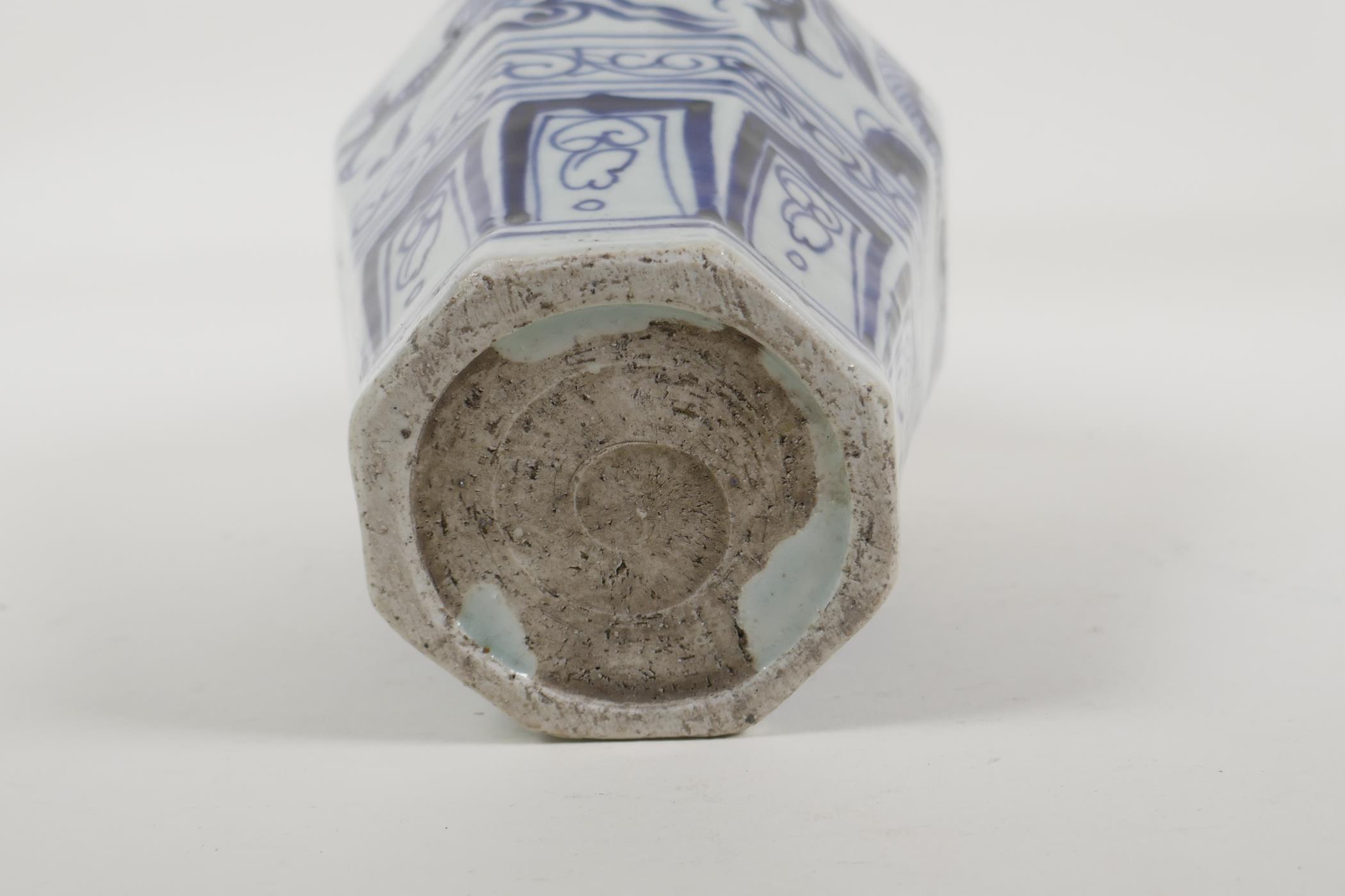A Chinese blue and white porcelain octagonal vase with dragon and flaming pearl decoration, 10" high - Image 5 of 5