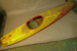 A yellow and red fibreglass flat bottomed slalom canoe by Topcraft Ltd, repairs, 116" x 22"