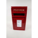 A metal post box with cast front and sheet construction, embossed 'Post Box', 17" high