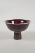 A Chinese flambe glazed porcelain stem bowl, 6 character mark to base, 6" diameter