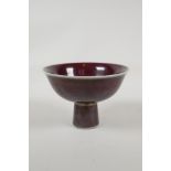 A Chinese flambe glazed porcelain stem bowl, 6 character mark to base, 6" diameter