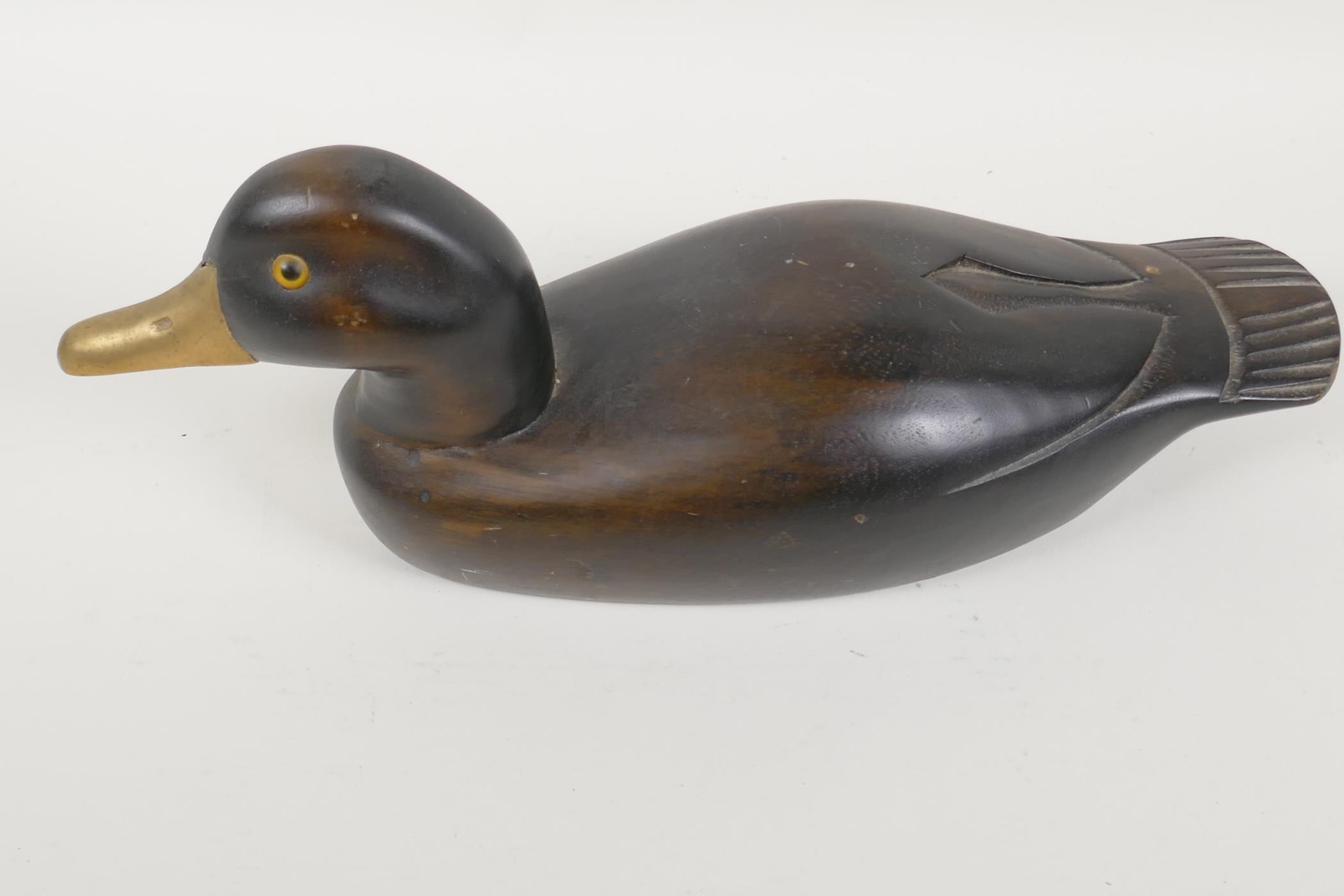 A carved wood decoy duck with glass eyes, 14" long - Image 2 of 3