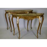 A pair of Italian painted and parcel gilt consul tables, mid C20th, 42" x 12" x 34"