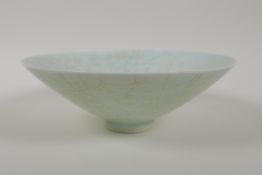 A Ru ware style celadon glazed conical bowl with incised underglaze decorated to the centre, 7"