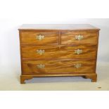 A C19th mahogany chest of two over two drawers, with brass plate handles, raised on bracket