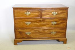 A C19th mahogany chest of two over two drawers, with brass plate handles, raised on bracket