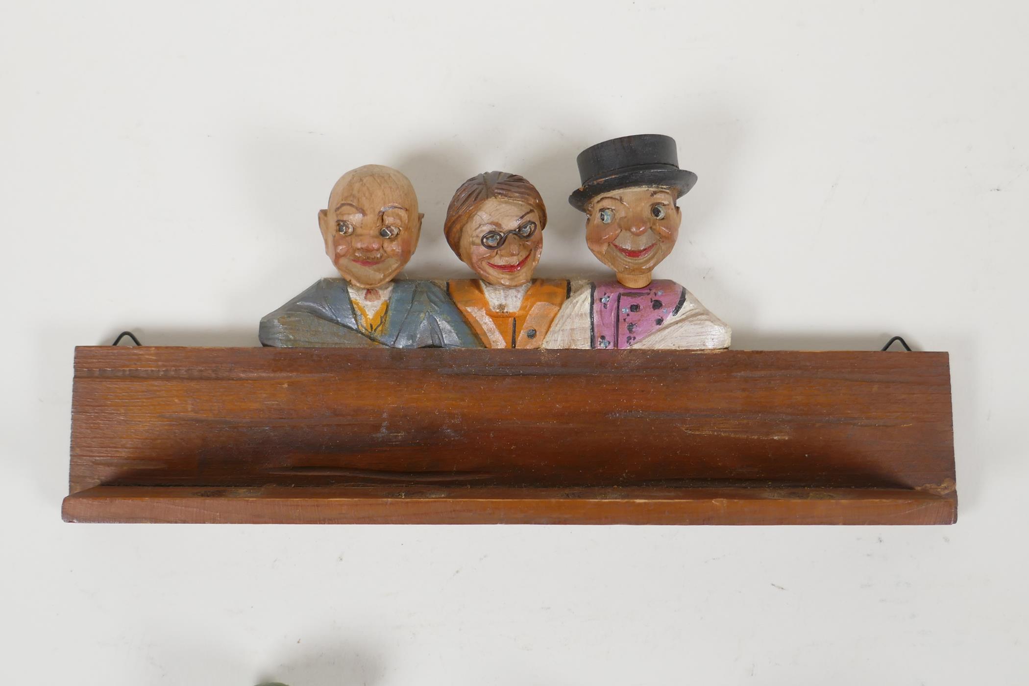 A set of four carved and painted Black Forest figural caricature bottle stoppers/pourers, in a - Image 7 of 7