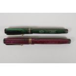 Two 'Swan' Mabie Todd leverless fountain pens with reptile skin effect cases, both with 14ct nibs