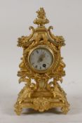 A C19th French ormolu mantel clock, with pagoda shaped top and dolphin mounts, raised on hoof