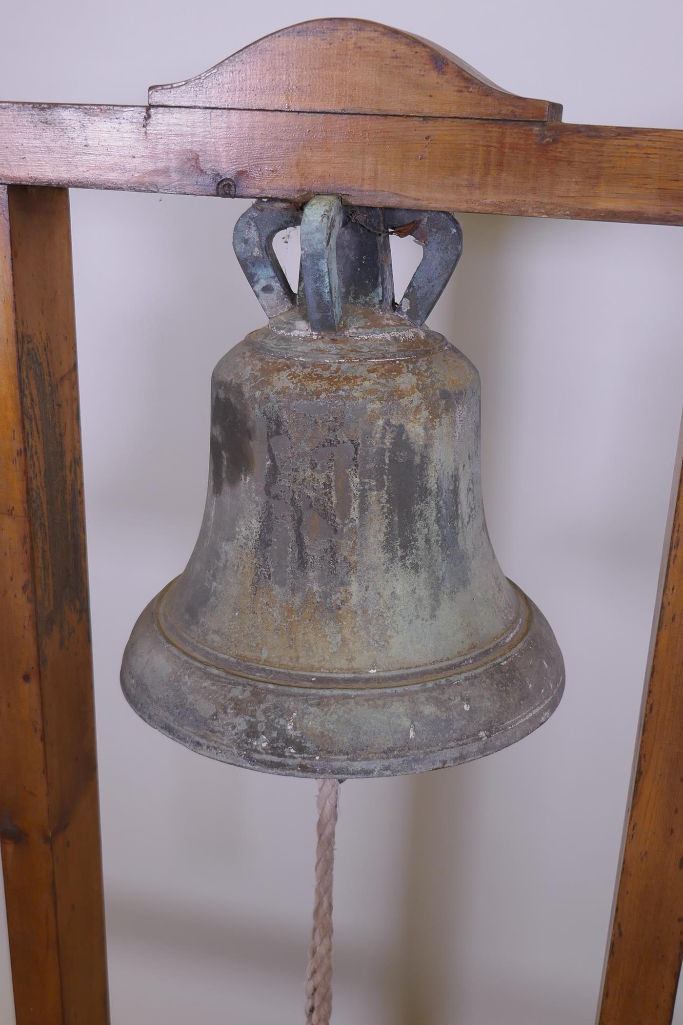 Antique bronze bell, mounted in a pine frame, 45" x 26" x 25" - Image 2 of 4