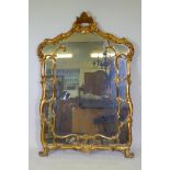 An Italian giltwood sectional wall mirror, mid C20th, 39" x 57"