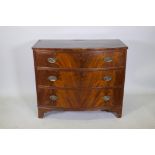 A Victorian figured mahogany bow front chest of drawers, raised on bracket feet, 37" x 20", 31" high