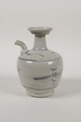 A Chinese blue and white porcelain pourer with stylised decoration, 5½" high