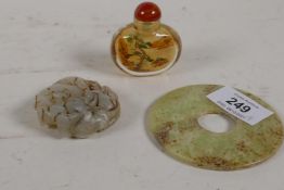 A Chinese carved hardstone ornament depicting three rams, a snuff bottle and soapstone pi-dish, 3"