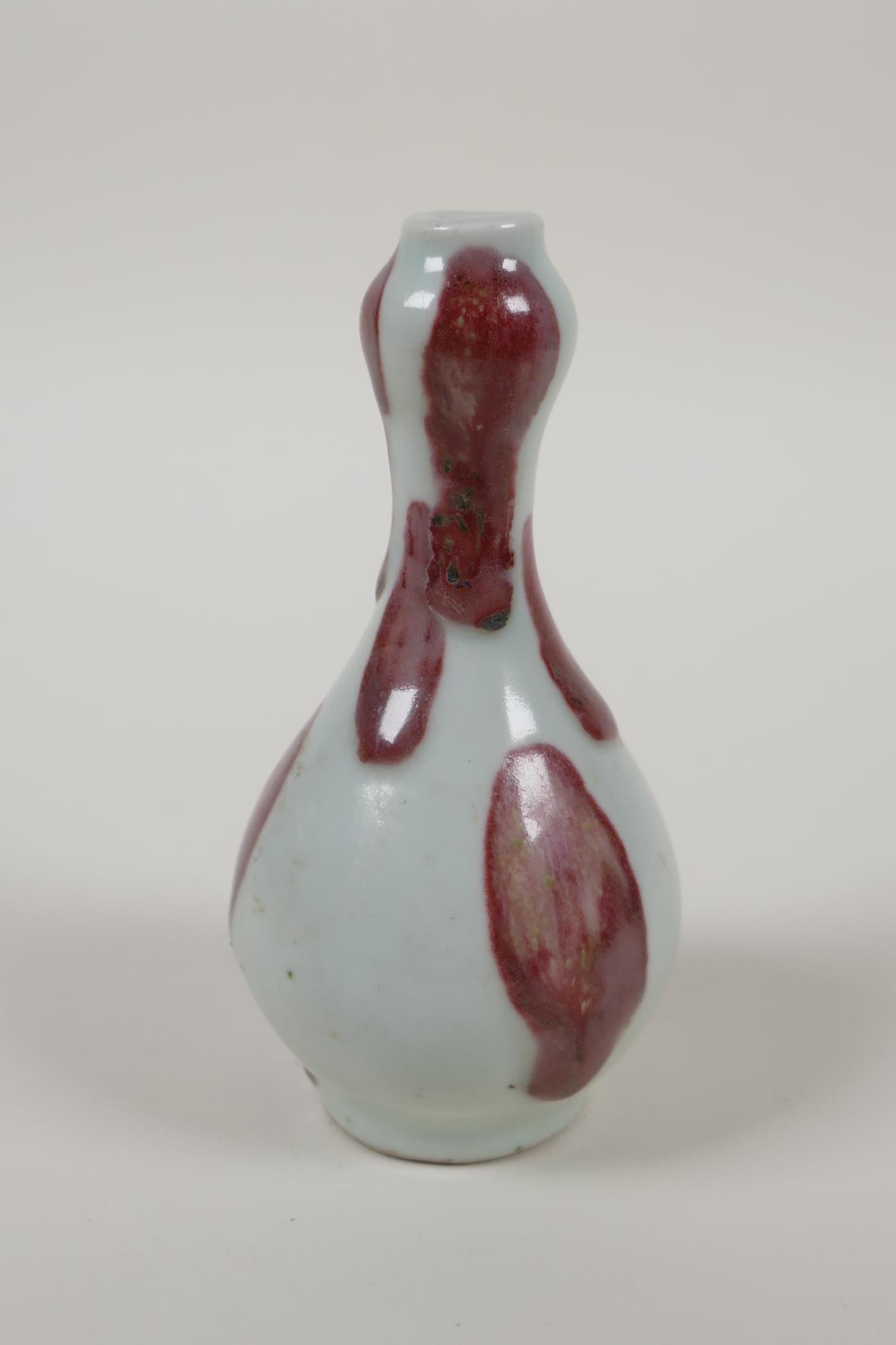 A Chinese red and white spot glazed porcelain spill vase, 5" high - Image 3 of 4