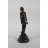 A bronze Art Deco style female figure, 7½" high
