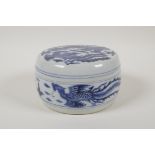 A Chinese blue and white porcelain drum shaped box and cover with phoenix decoration, 6 character