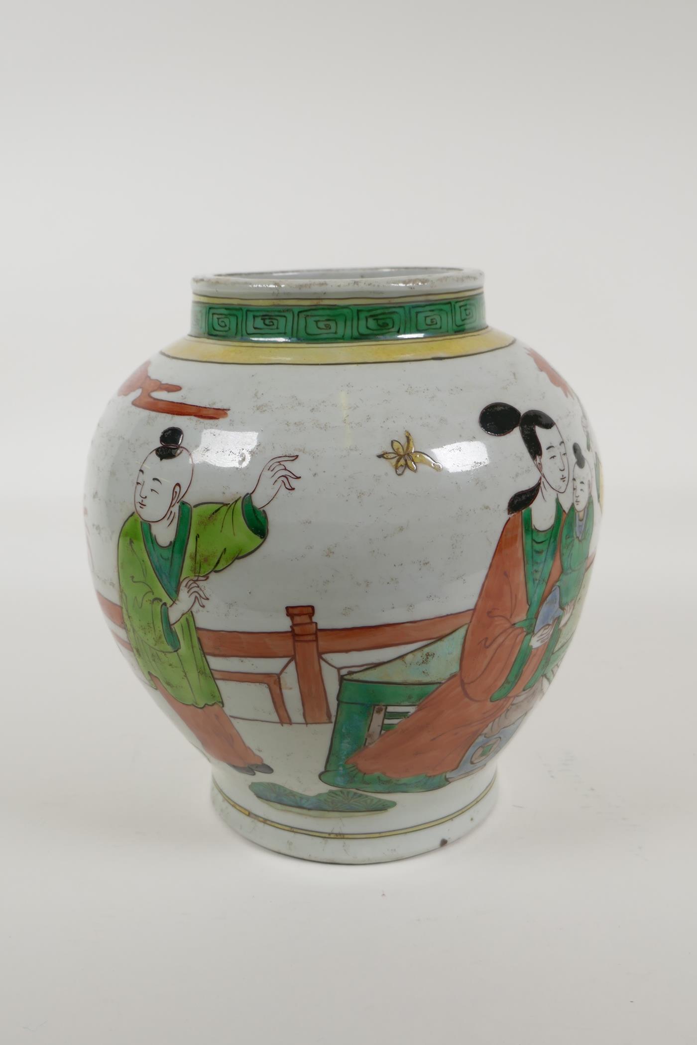 A Chinese Wucai porcelain jar decorated with women and children in a garden, 8½" high - Image 4 of 5