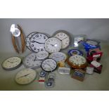 A quantity of wall clocks, battery, clockwork and main alarm clocks