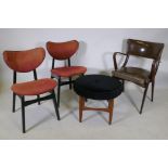 A pair of G-Plan mid-century butterfly dining chairs designed by E. Gomme, a G-Plan Danish design