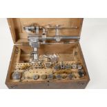 A Lorch Schmitt & Co watchmaker lathe, 9½" long, with accessories, in original box