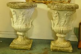 A pair of vintage concrete garden urns, with classical frieze decoration, 34" high