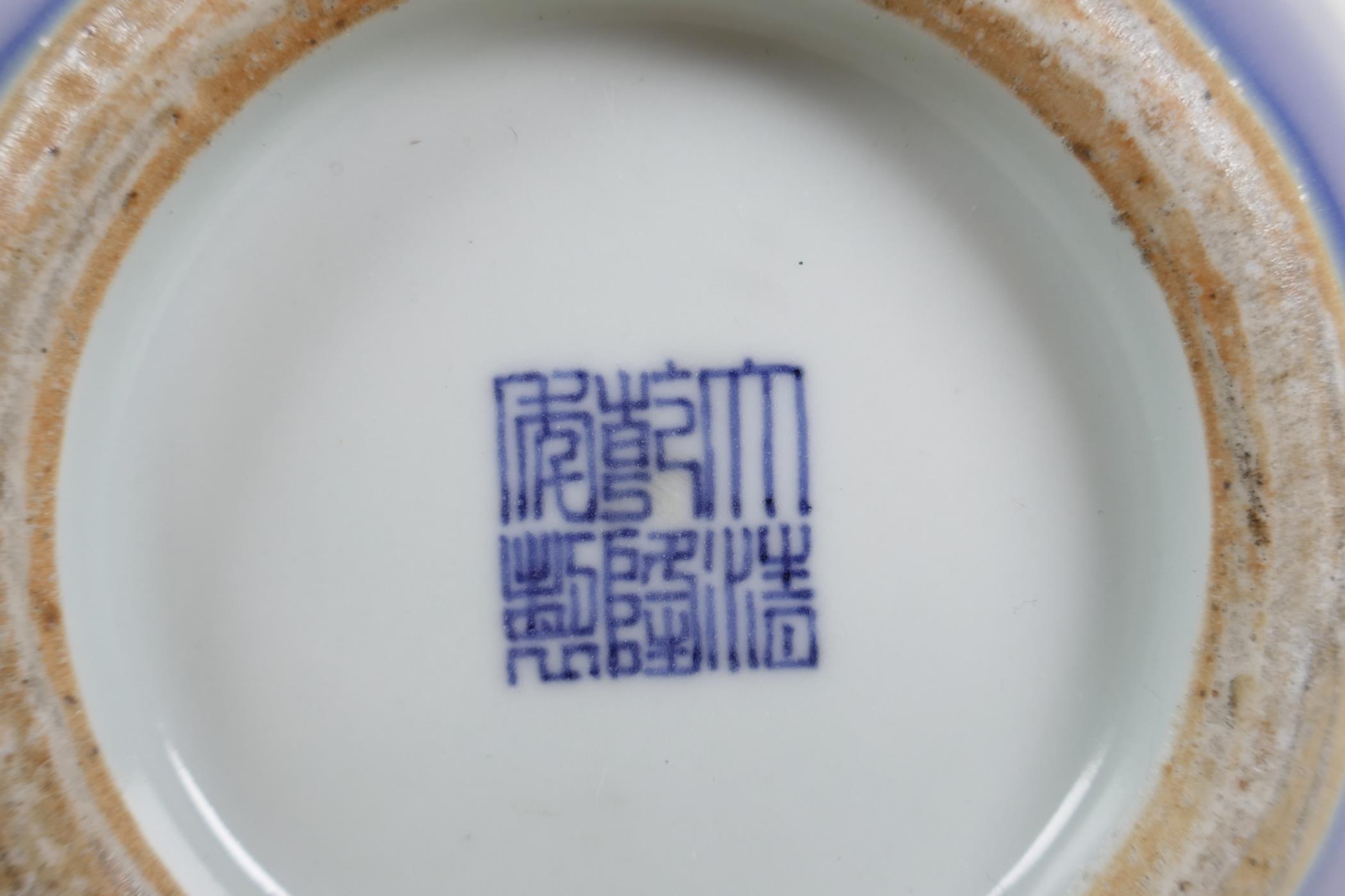 A blue glazed porcelain vase with white enamelled floral decoration, Chinese Qianlong seal mark to - Image 5 of 5